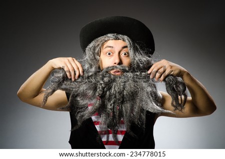 Funny pirate with long beard