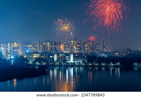 Hyderabad cityscape in Telangana state, India. illuminated with Diwali festival fireworks. Royalty-Free Stock Photo #2347789843