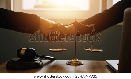 Businessman shaking hands to seal a deal with his partner lawyers or attorneys discussing a contract agreement Royalty-Free Stock Photo #2347797935