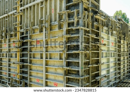 Concrete wall construction, concrete formwork installed closeup at construction site Royalty-Free Stock Photo #2347828815
