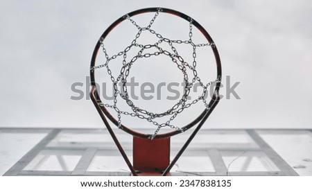 photo basketball at female's feet on a field