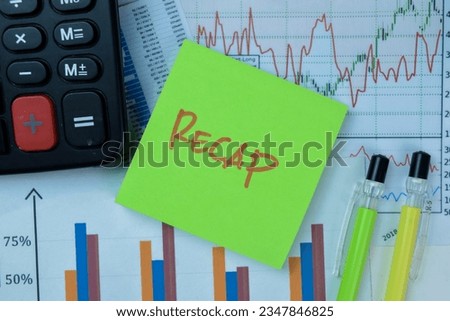 Concept of Recap write on sticky notes isolated on Wooden Table. Royalty-Free Stock Photo #2347846825