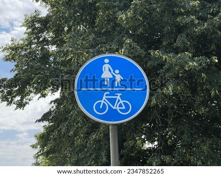 road sign for shared bike and footpath
