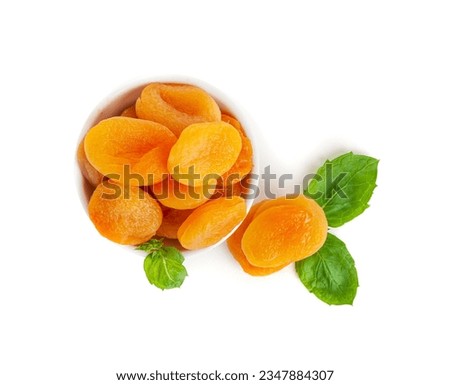 Dry Apricot Stack with Green Leaves Isolated, Dried Apricots Pile in Bowl, Healthy Orange Fruits Group, Sweet Organic Dessert Snack, Healthy Diet Food, Dry Apricots on White Background Royalty-Free Stock Photo #2347884307