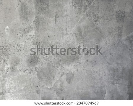 Gray Raw grunge cement wall with scratch line texture. Loft style of concrete house or building wall. Softness gray cement wall surface for background structure work. Weathered concrete pattern wall. Royalty-Free Stock Photo #2347894969