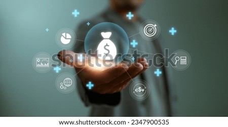 Businessman or trader showing icon of business and finance, Investment concept, invest money, business and finance, capital fundraising, dollar loan credit, trade, trader, invest in trading. Royalty-Free Stock Photo #2347900535