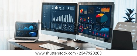 Business intelligence chart and graph display on computer monitor at corporate office. Dark blue interface of dashboard data analysis dashboard. Financial database for business marketing. Trailblazing