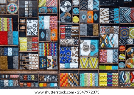 Neat arrangement showcases a variety of vibrant cloth patterns Royalty-Free Stock Photo #2347972373