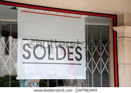soldes french text means sale white sign in facade fashion clothing store