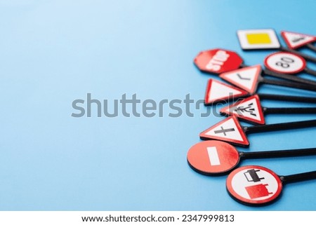 driver education, road signs road signs on a blue background, copy space