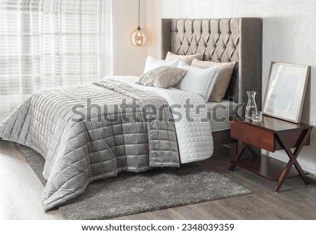 luxury bedroom with Silk Throw Gray and comfortable pillows on bed, interior design concept, Boutique Hotel