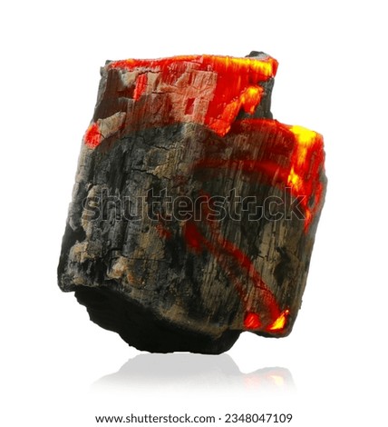 Piece of smoldering coal isolated on white Royalty-Free Stock Photo #2348047109