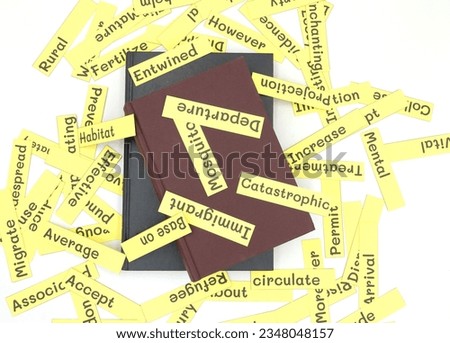 isolated English vocabulary flashcards and textbook on white background Royalty-Free Stock Photo #2348048157