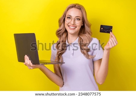 Photo of sweet adorable lady wear purple polo spectacles online shopping modern gadget isolated yellow color background