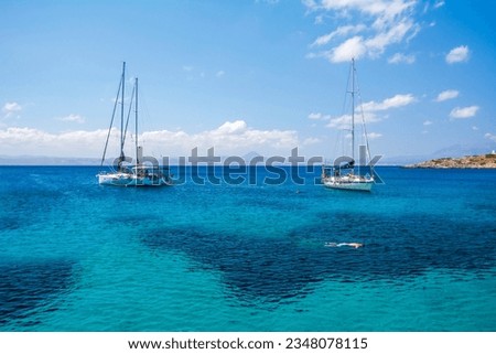 Boat Anchorage in Agios Georgios Bay at Dia Island, Crete, Greece  Royalty-Free Stock Photo #2348078115