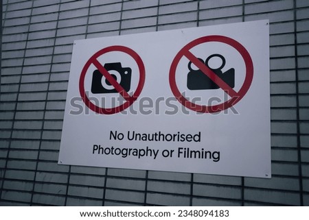 Signs unauthorised photography or filming in Singapore