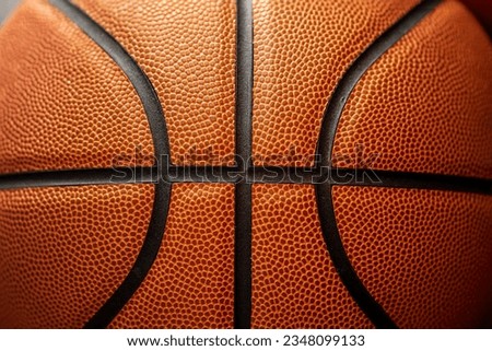 Part of old ball rotated. Abstract close up of leather basketball ball, sport textured background