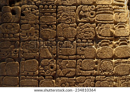 Mayan pictograph at Tikal, the Mayan ruins, Guatemala Royalty-Free Stock Photo #234810364