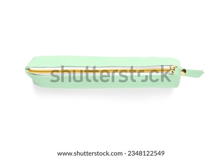 Green pencil case on white background