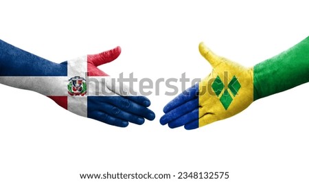 Handshake between Saint Vincent Grenadines and Dominican Republic flags painted on hands, isolated transparent image.