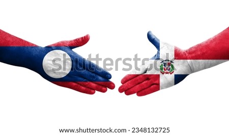 Handshake between Dominican Republic and Laos flags painted on hands, isolated transparent image.