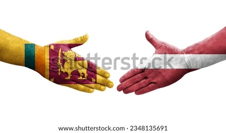 Handshake between Sri Lanka and Latvia flags painted on hands, isolated transparent image.