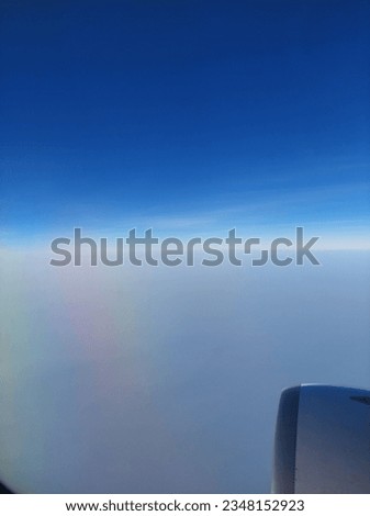 The picture of sky and rainbow from the airplane