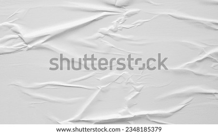 white crumpled and creased paper poster texture background Royalty-Free Stock Photo #2348185379