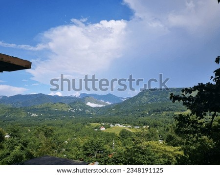 blue sky and mountain with greenery after rainfall, looks amazing and beautiful