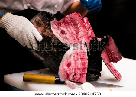 Freshly dismantled parts of the tuna. Royalty-Free Stock Photo #2348214753