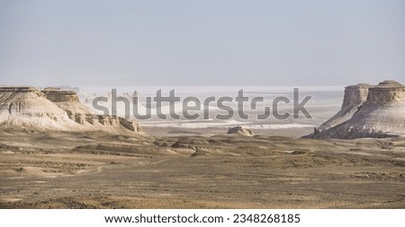 Panorama of hills and ridges with limestone and chalk slopes in the Kazakh steppe, relief folds in the desert tract of Boszhira