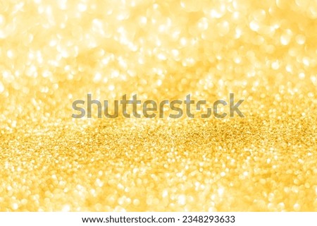 Gold glitter defocused texture background. gold christmas abstract background
