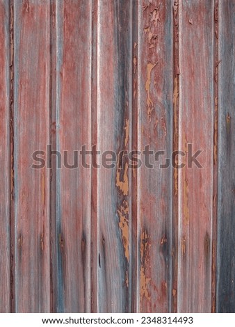 Red painted old wooden wall. Red background.