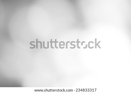 Silver Festive Christmas background. Abstract twinkled bright background with natural bokeh defocused white lights. Holiday party background with blurry special magic effect.  Royalty-Free Stock Photo #234833317