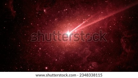 Falling meteorite, asteroid, comet in the red starry sky. Elements of this image furnished by NASA. 