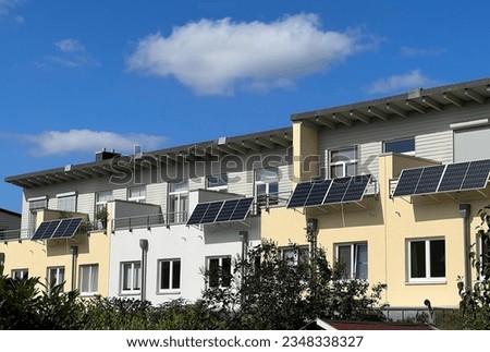 balcony power plants on terraced houses Royalty-Free Stock Photo #2348338327