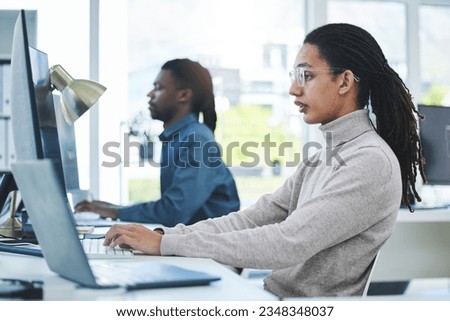 Business people, computer and typing in office for marketing research, multimedia planning or copywriting. Professional worker or editor typing on desktop for editing online and analysis in workspace