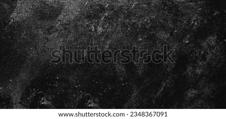 Panoramic background - old black concrete wall in high contrast