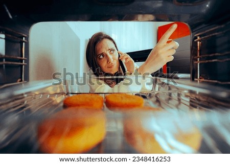 
Woman Calling Repair Service for her Broken Cooking Over. Girl speaking on the phone trying to fix her stove
 Royalty-Free Stock Photo #2348416253