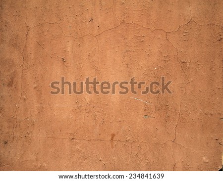 Texture of old rustic wall covered with brown stucco