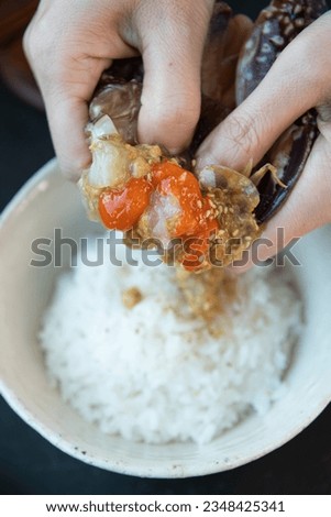 Soy Sauce Marinated Crab on White Rice Royalty-Free Stock Photo #2348425341