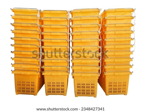 The vibrant orange plastic basket with durable handles is a versatile storage solution for organizing items in your home, kitchen, and beyond on witch background , isolated Royalty-Free Stock Photo #2348427341