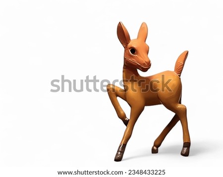 Miniature animal fawn statue on white background