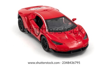 Metal sport toy car isolated on white background. High quality photo