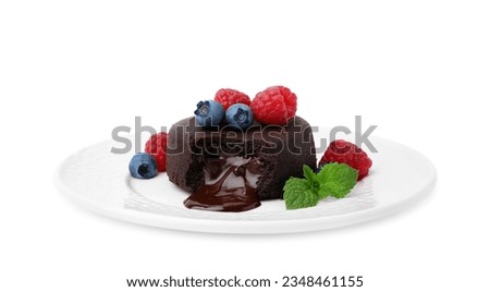Plate with delicious chocolate fondant, berries and mint isolated on white Royalty-Free Stock Photo #2348461155