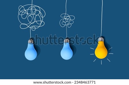 Clarifying complex ideas through the glow of lightbulbs - Flat lay Royalty-Free Stock Photo #2348463771