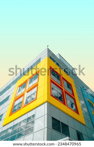 Yellow building with sky and blue theme
