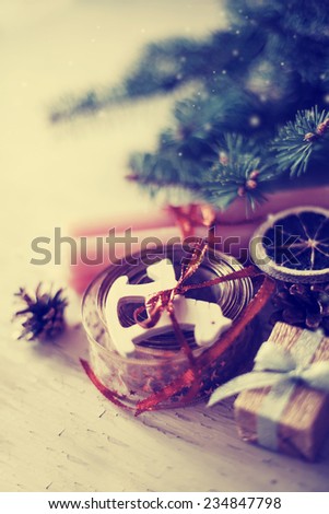 Christmas background with christmas decorations and candles / toned pictures 