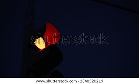 
photo of red light with night shades