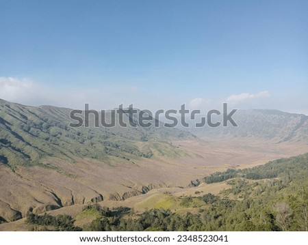 the beautiful scenery above Mount Bromo, the country above the clouds Royalty-Free Stock Photo #2348523041